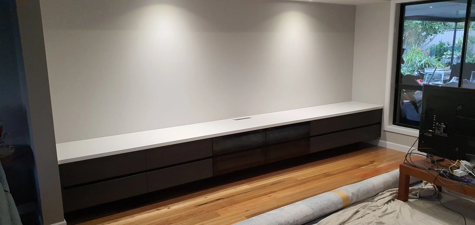 Built-in wardrobe with timber-look sliding doors