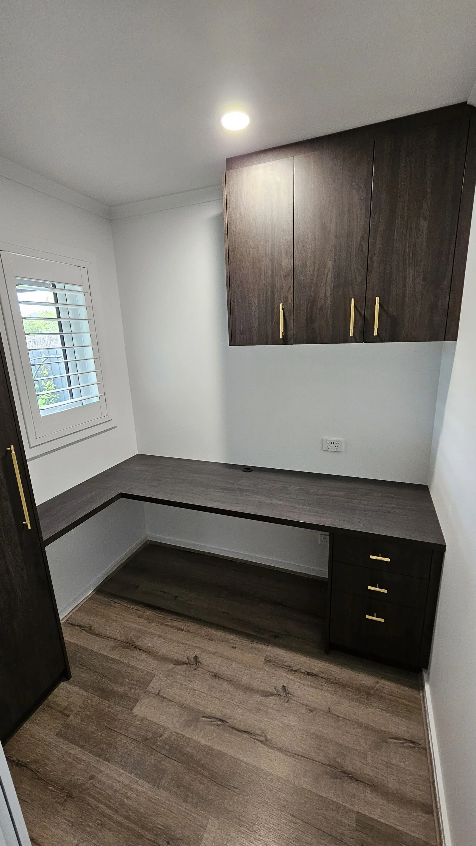 Built-in wardrobe with shelving and rails fitted by Brodco