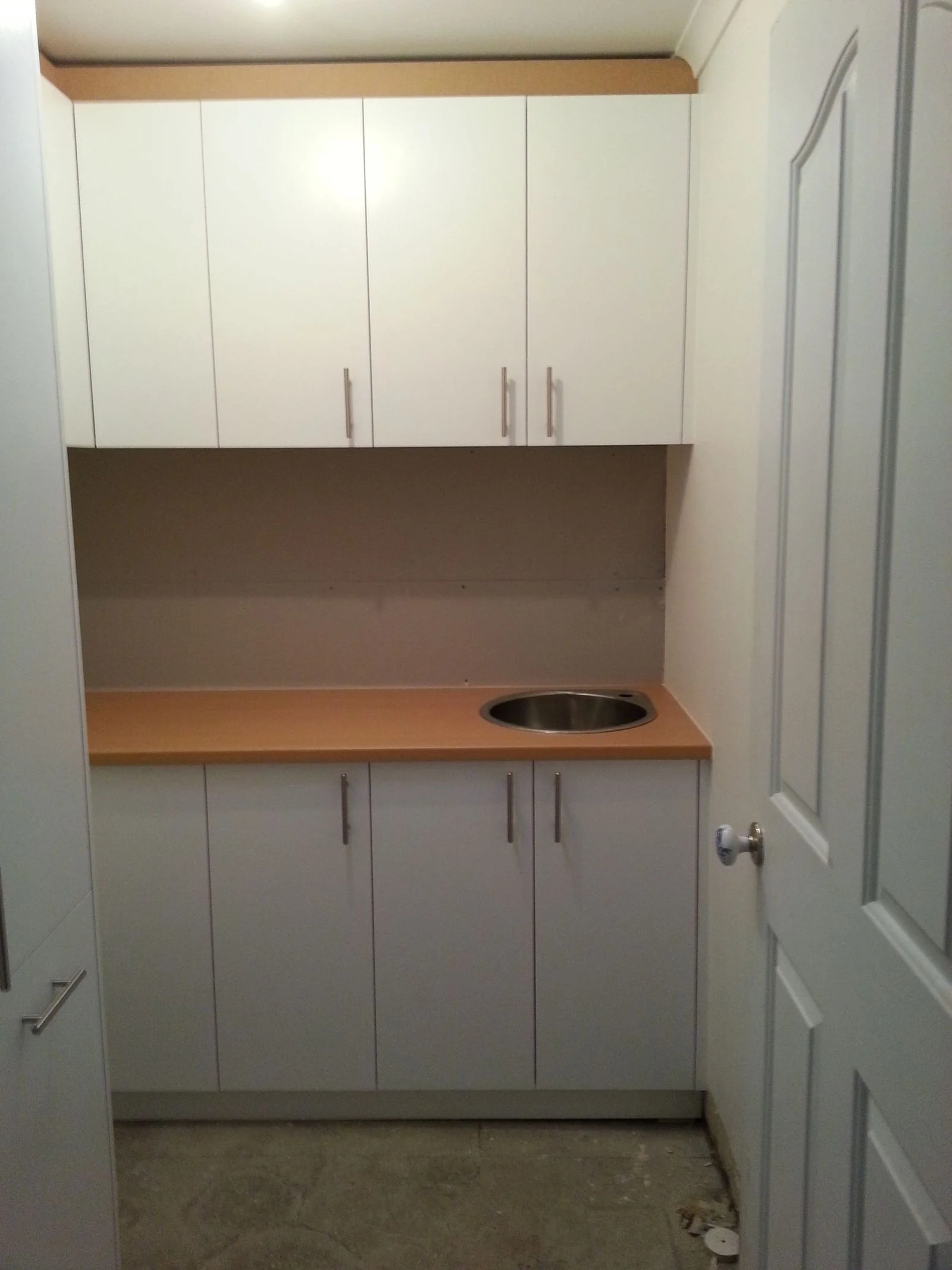 Custom wardrobe interior with adjustable shelving
