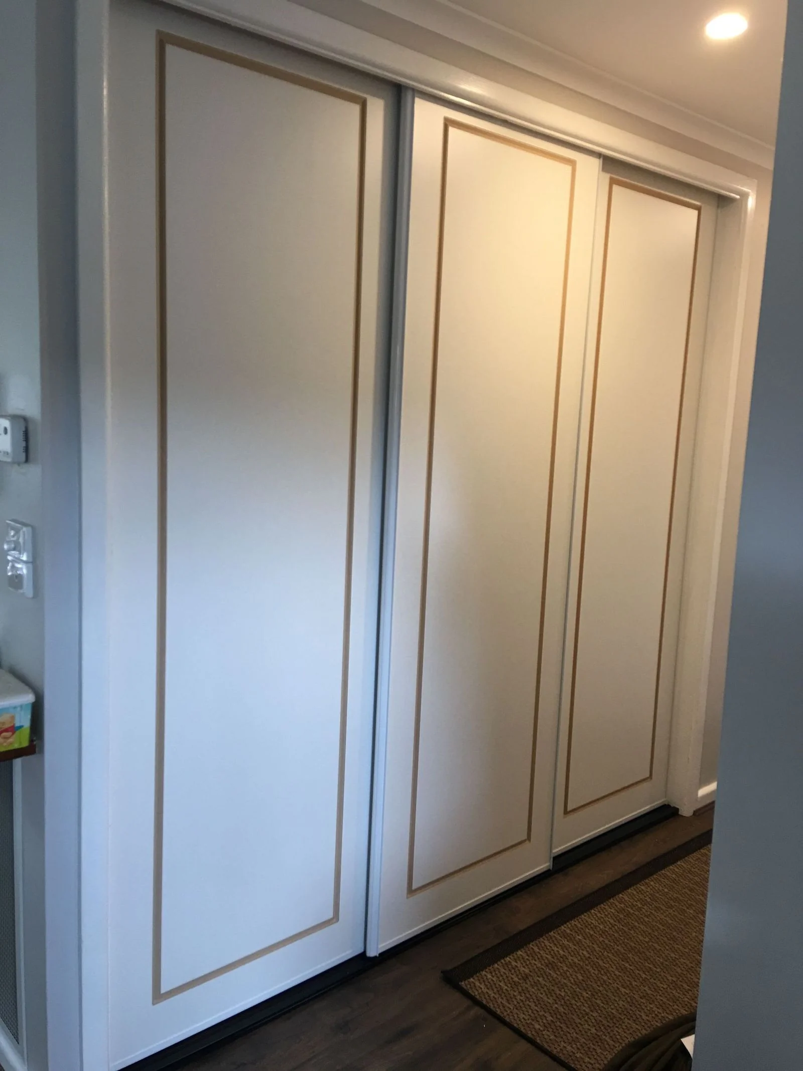 Sliding wardrobe doors with a simple aluminium frame